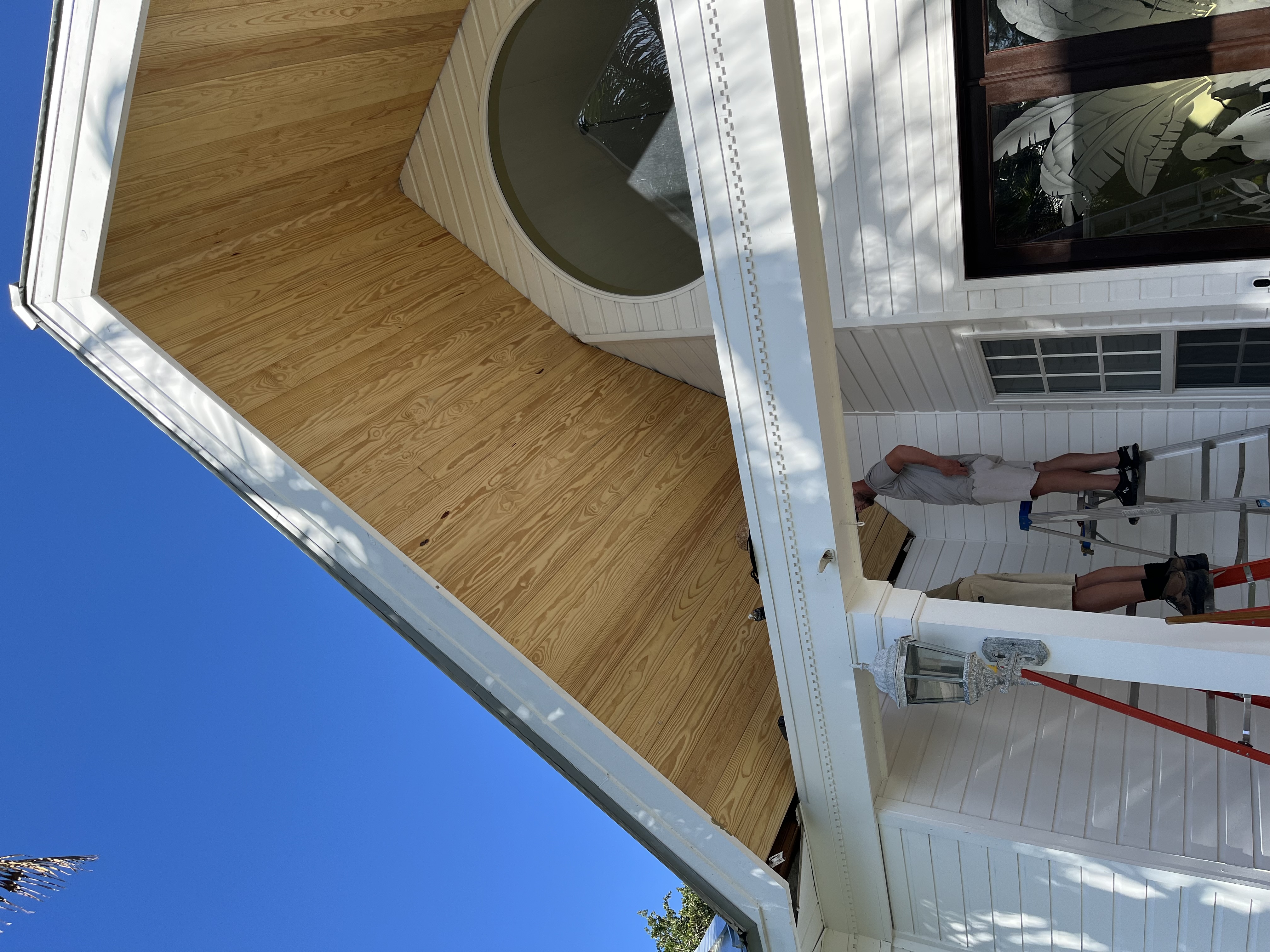 RD crew checking the fit as more tongue and groove boards were added across the gable
