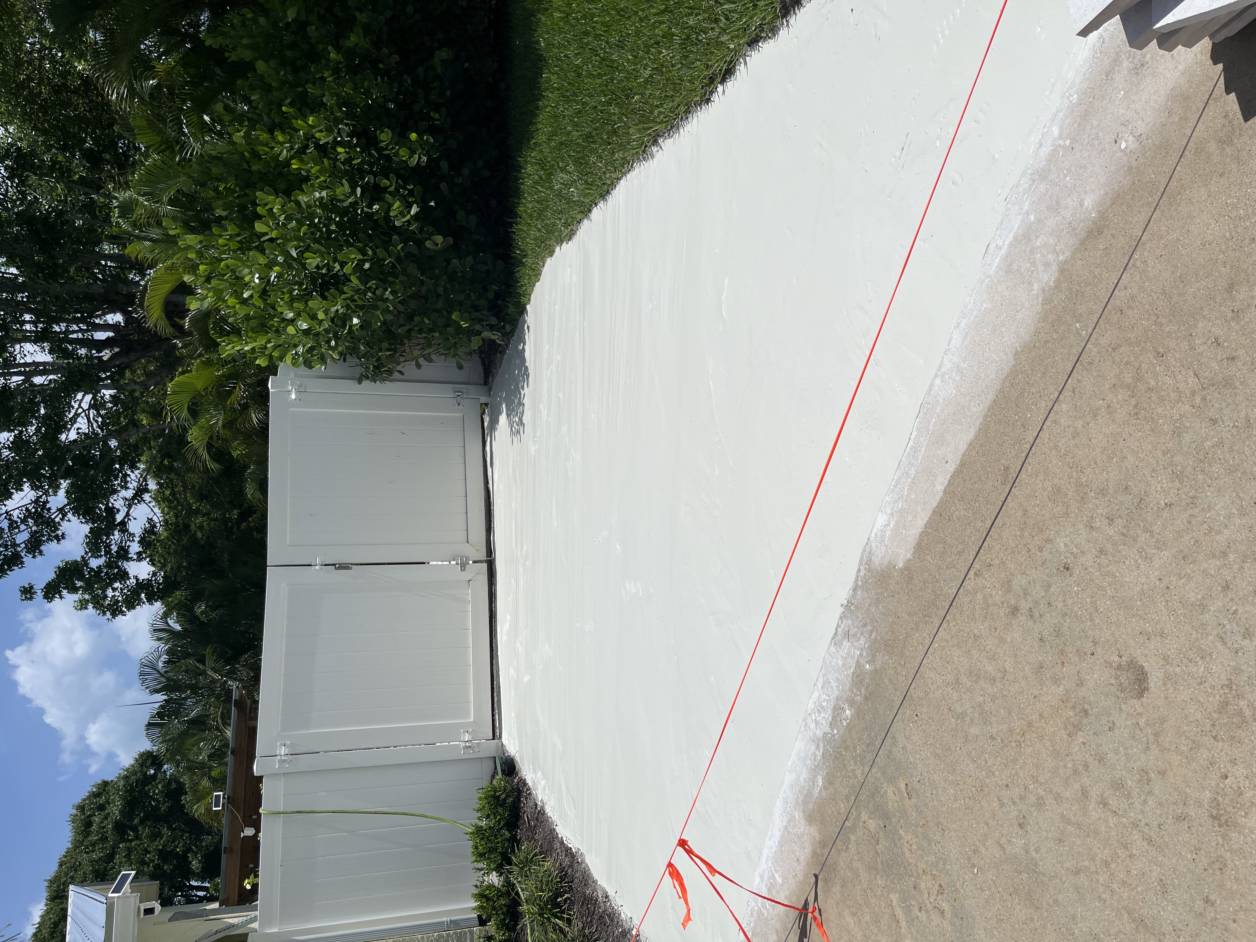 Completed concrete section with a bright finished surface and layout lines in place