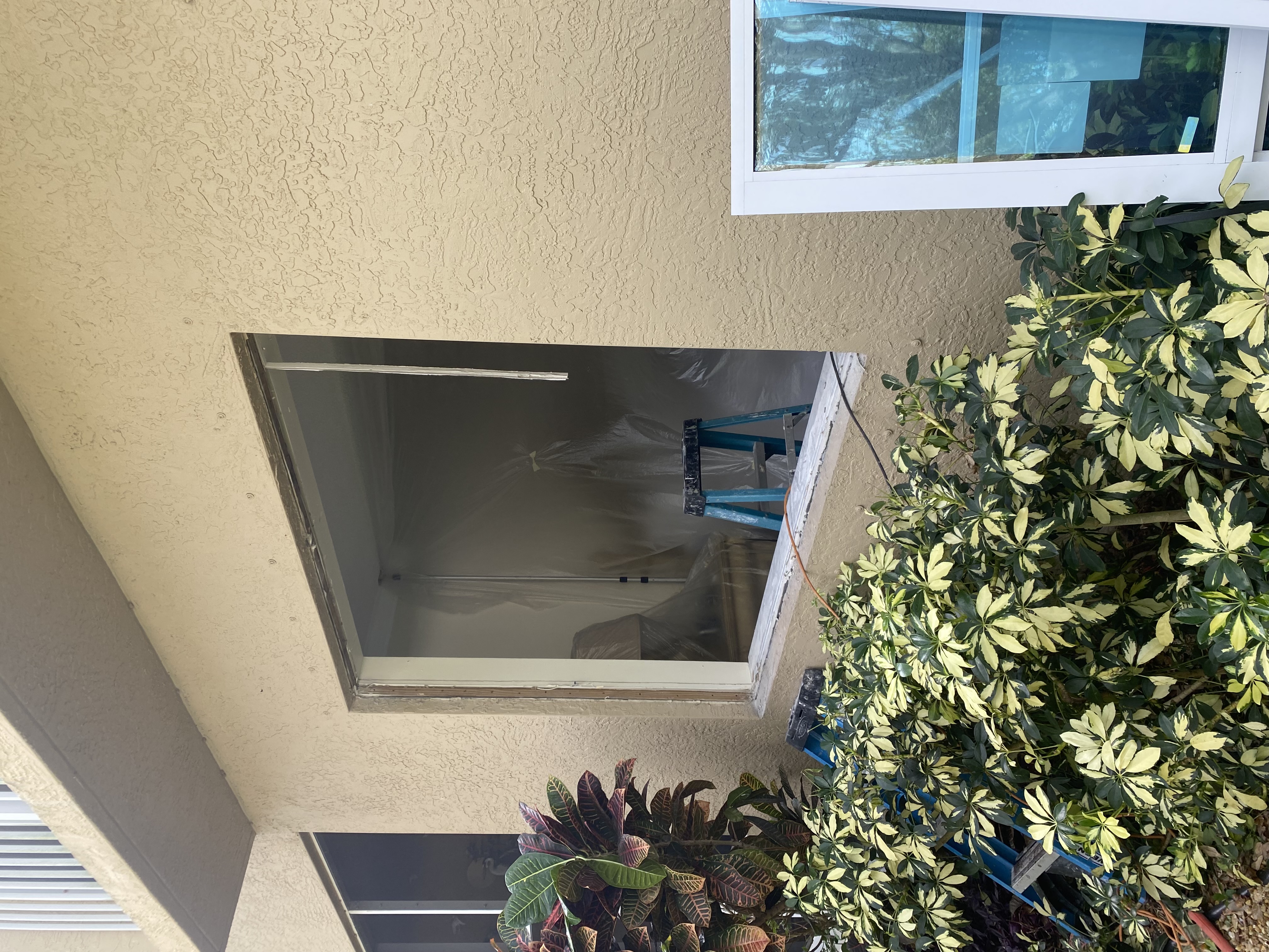 Exterior wall opening prepared for a new window installation